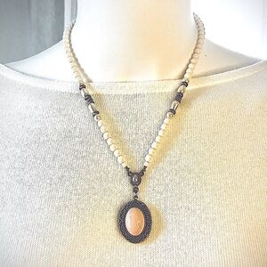 1928 Pendant Locket Necklace, gold tone, pink stone, cream beads